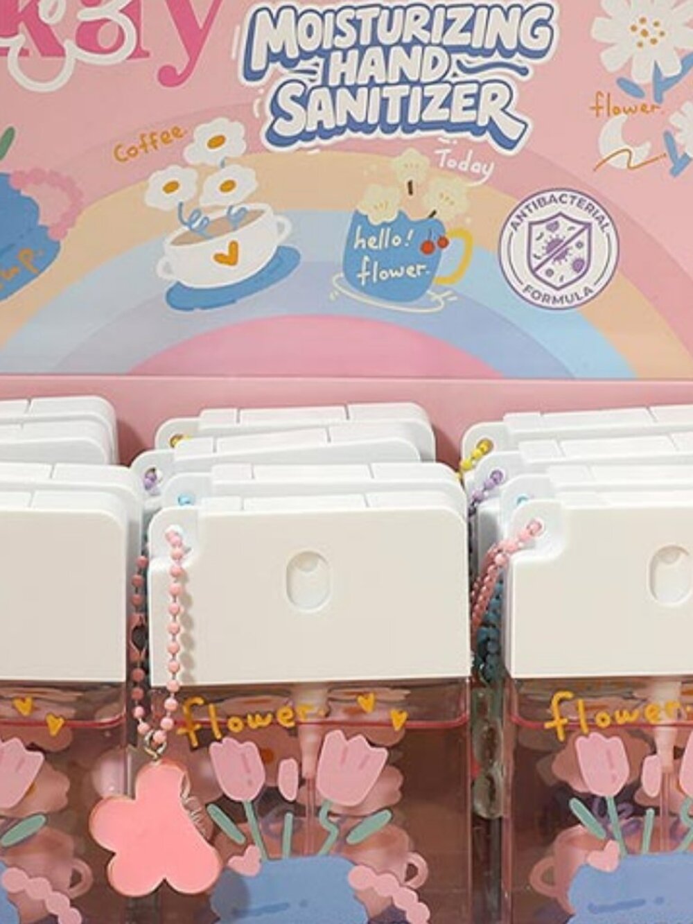 12 WHOESALE HAND SANITIZERS WITH CHARMS, A CASE